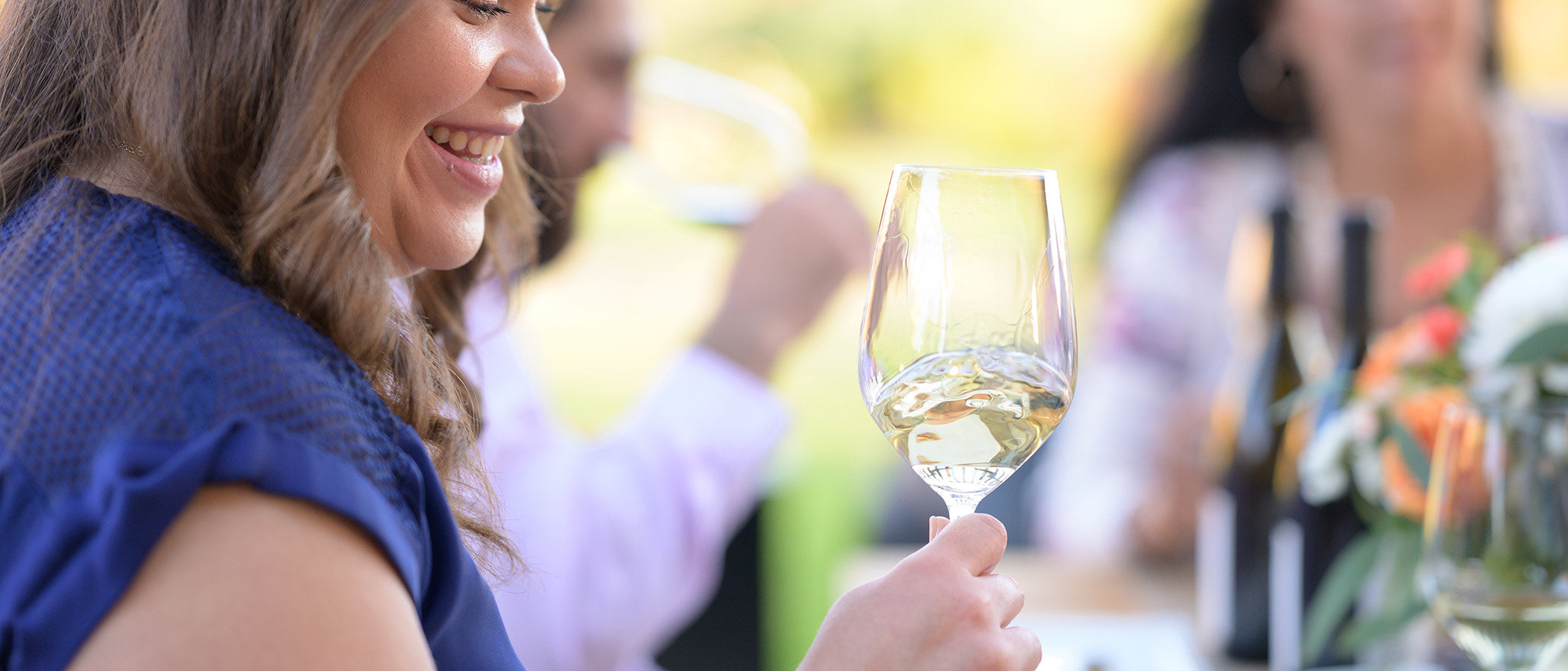 Swirling a glass of Malvasia Bianca on the patio at RD Winery