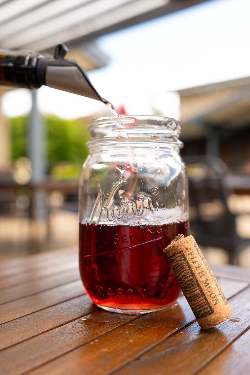 Wine poured into a mason jar