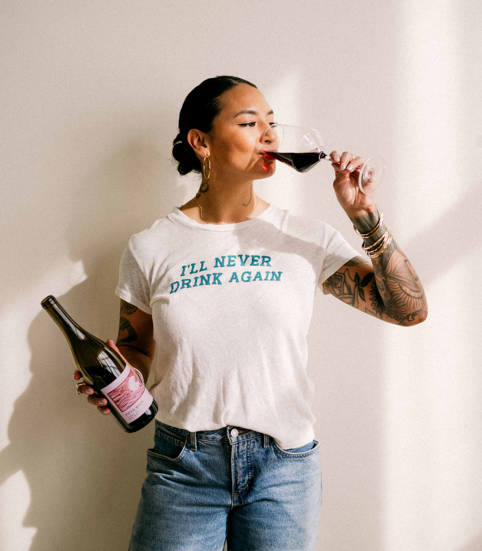 Woman enjoying a glass of red wine