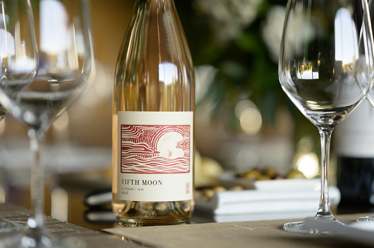 Bottle of Fifth Moon Rosé on a table
