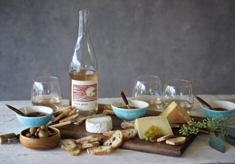 Cheese plate and bottle of rosé