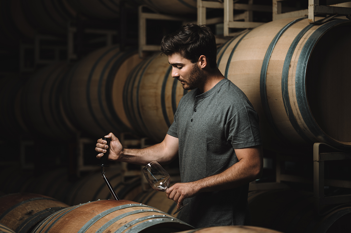 Assistant Winemaker Connor Bockman Sampling Barrels