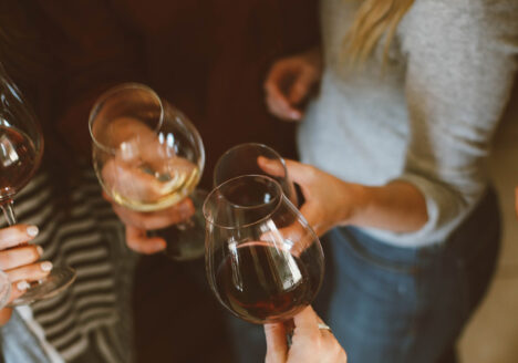 Group of women clinking glasses