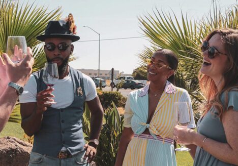 Stylish tasting room guests chatting