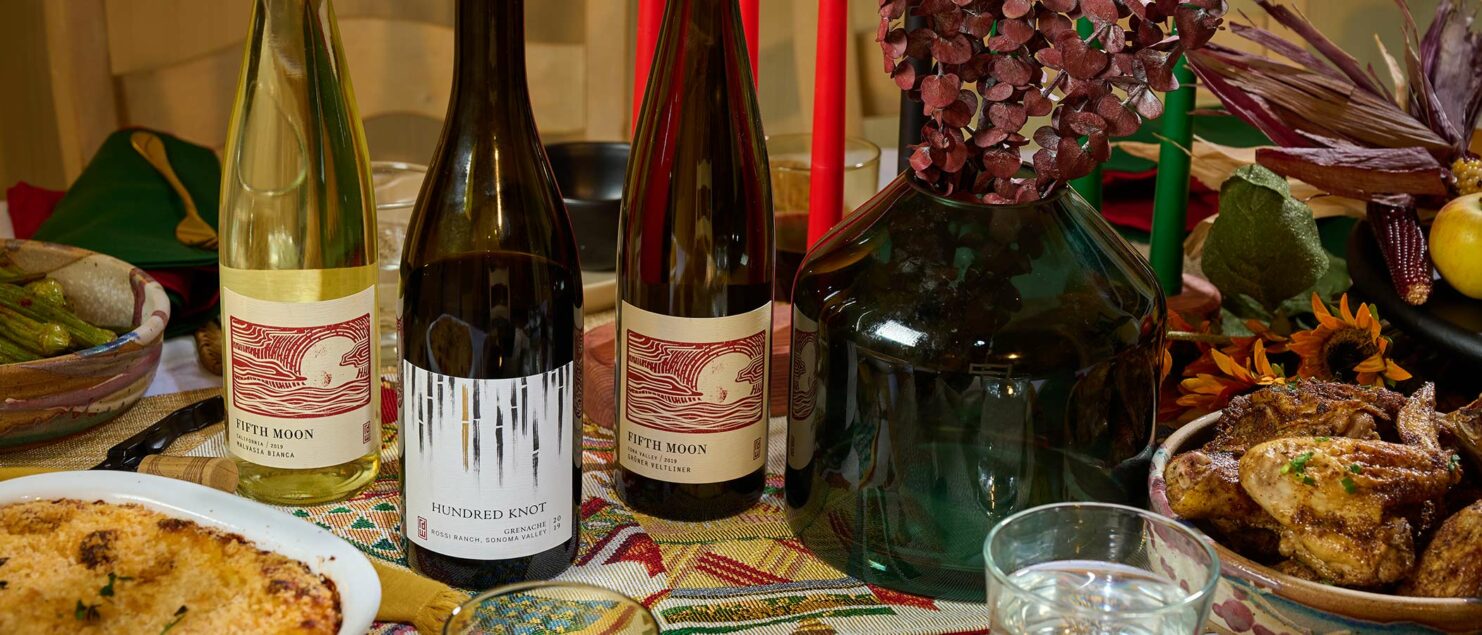 Kwanzaa dinner table spread with wine