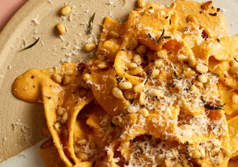 Pink sauce pasta on a beige plate