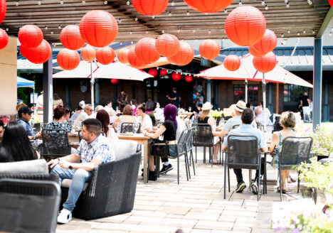 people enjoying wine on the patio