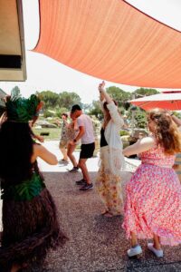 Winery guests learning Polynesian dance