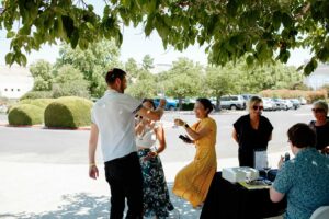 Happy guests arriving at winery event and checking in