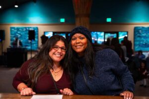 Friends smiling in tasting room